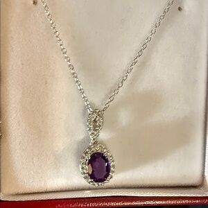Elegant Silver Necklace with Purple Gemstone